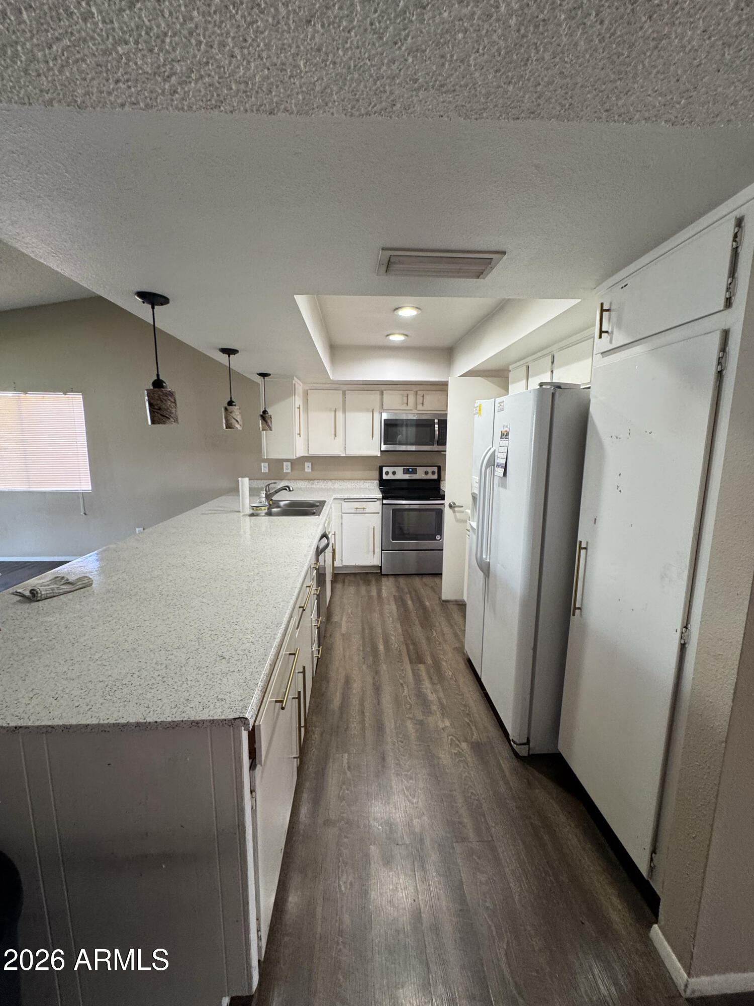 6540 W HAZELWOOD Street