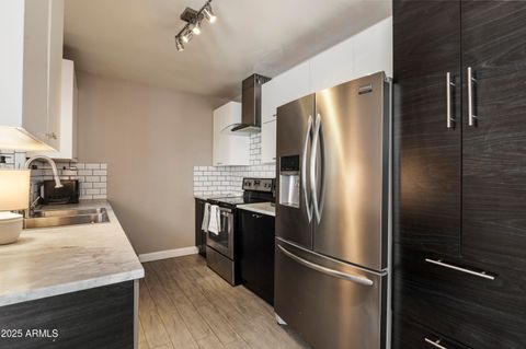 Photo of 102 W Maryland Avenue #C1, Phoenix, AZ 85013 (MLS # 6909989)