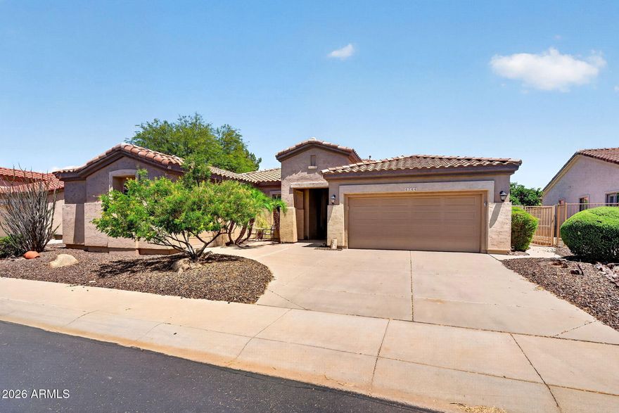Located in the gated 55+ community of Trilogy at Power Ranch, this single level home has been owned by the original owners and thoughtfully maintained over time. If you've been waiting for a layout that actually makes sense, this is it. 2 bedrooms, 2.5 baths, a den, and a separate flex space that gives you options without forcing one use, dining, library, or a place to gather. The 3 CAR GARAGE gives you room for your golf cart or extra storage. Big ticket items like the roof and HVAC were recently REPLACED, which matters. The backyard is private and FENCED with a water feature that provides for tranquil mornings. Trilogy offers golf, fitness, pickleball, dining, and events, but what buyers tend to love is how livable it feels day to day, active when you want it, quiet when you don't. All in Gilbert, close to shopping and restaurants.