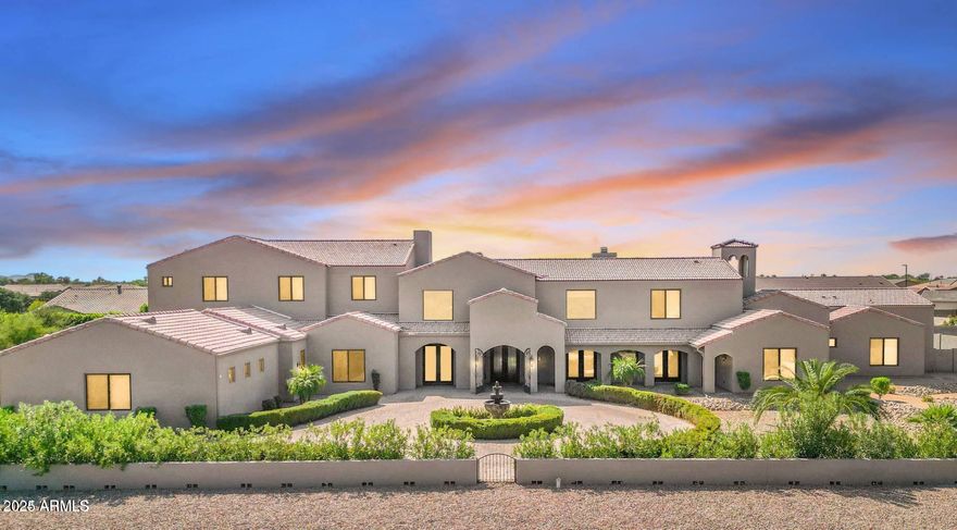 This stunning, custom-designed private estate offers unmatched flexibility, whether you seek a primary residence, a luxury investment property, or a 1031 exchange opportunity. 

Completed in 2020 and owned by a single owner, this home blends sleek modern lines with classic Tuscan elements, creating an atmosphere of refined elegance. The grand circular paved driveway and picturesque water fountain make a striking first impression, while the setback design, surrounding wall, and lush greenery—maturing up to eight feet—ensure privacy.  

With over 36,000 square feet of land and no HOA, this estate provides ample space to build a casita, RV gargarage, workstation, or other custom amenities to suit your lifestyle. This home also offers peace of mind with major components, including the roof, AC units, EV charging station, and water heaters, all still virtually new. Whether purchasing as a primary residence or a strategic investment, this property is a rare opportunity to own a premier estate in Chandler. Contact us today to explore how this exceptional home can meet your lifestyle or investment goals.the solar panels will be PAID OFF at closing adding to its energy efficiency and long-term savings for the new owner. The entrance, framed by a double iron gate, leads to a home filled with luxury details. Upon entering, you're greeted by natural light that flows through the large dual pane low-e windows drawing your eyes to the wood beams and soaring 24-foot ceiling great room featuring a gas fireplace. Two sets of French doors open to reveal a resort-style backyard, perfect for seamless indoor-outdoor living. Arched hallways add a touch of timeless elegance, gracefully connecting expansive living spaces throughout the home.

The heart of the home, the gourmet kitchen, is designed to impress. A 20-foot island with breakfast bar seating invites family and guests to gather, while luxury appliances, including a 36" gas oven, a 42" built-in fridge, two dishwashers, and top-of-the-line granite and quartz countertops, make cooking a true pleasure. Custom solid wood cabinetry with soft-close features adds a touch of elegance and practicality. The formal dining room, with its grand chandelier, is ideal for hosting memorable dinner parties.

Escape to your private sanctuary in the primary suite, located in its own wing of the home for ultimate privacy. This retreat features an extra-large sitting room, perfect as a personal living area or reading nook, with French doors that open directly to the backyard. The spa-like primary bath offers dual vanities, a heated jacuzzi tub, and a separate shower, creating the perfect place to unwind + there are two separate closets! A private office just off the bedroom adds functionality and privacy for working from home.

Entertainment is never far away, with a media/theater-style loft featuring a bar area, perfect for movie nights. The resort-style backyard, completed in 2021, is your private oasis. Take a dip in the heated pool or jacuzzi, relax under the covered patio, or gather under the pergola with ceiling fans for added comfort. A large artificial turf area provides the perfect space for play, while multiple seating areas, a built-in BBQ, and an outdoor fireplace ensure endless possibilities for outdoor enjoyment and relaxation.

Located within a top-rated school district and just minutes from the highly sought-after Arizona College Prep High School! Nearby amenities include Chandler Fashion Square, Downtown Chandler, Ocotillo Golf Club, and Downtown Gilbert (just 15 min. away!), all offering excellent dining, shopping, and entertainment options. With easy access to Loop 202, 101, and I-10, commuting is convenient, and the Price Corridor is home to companies like Intel, Northrup Grumman, and Wells Fargo is only 20 minutes away. This extraordinary property offers the perks of city living with the privacy and luxury of a secluded estate!

Google Maps will take you to the community behind the home. Please use 13017 E Chandler Heights Rd for accurate directions. MUST BE ACCOMPANIED BY AGENT.

Serious sellers - don't miss this rare opportunity!