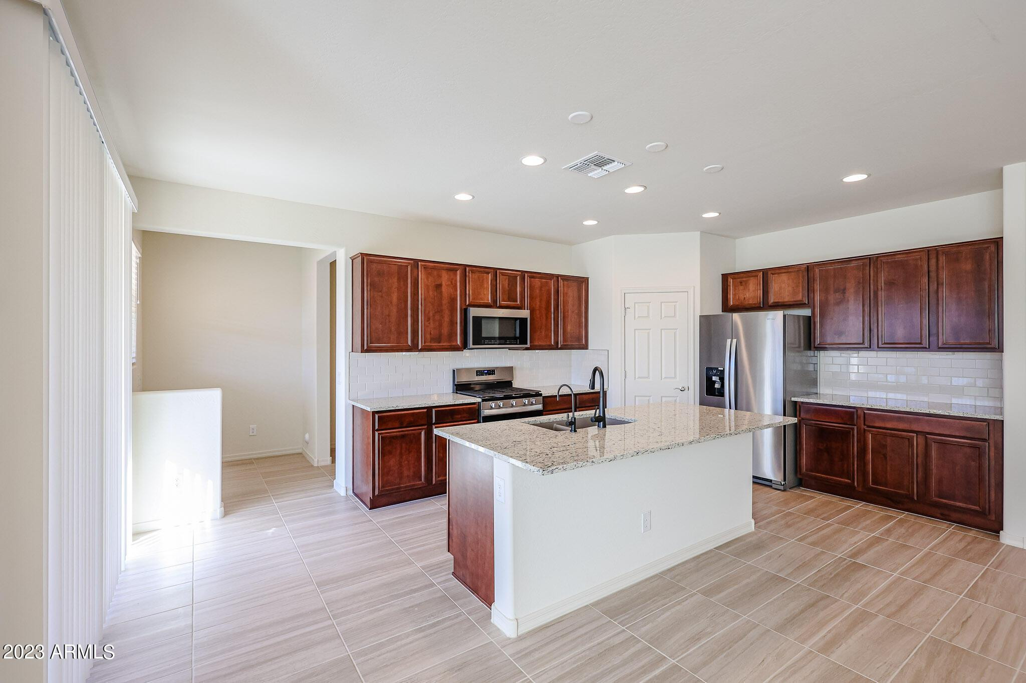 9039 W San Juan Avenue