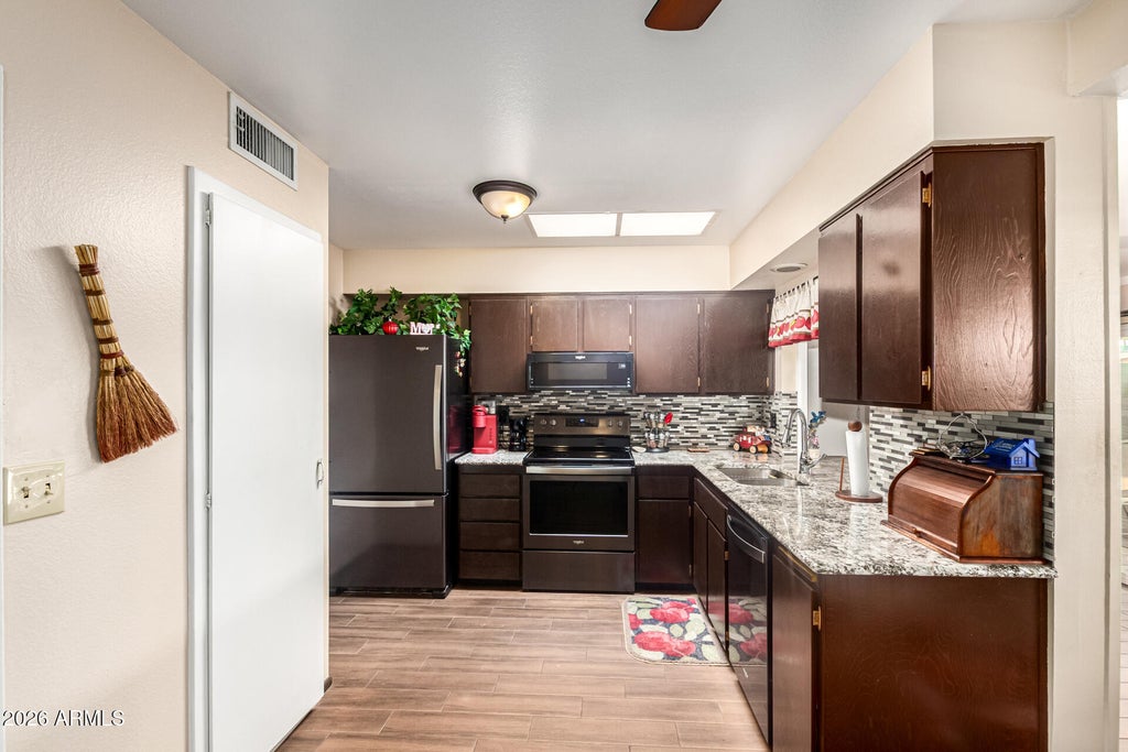 Photo of 10870 W Santa Fe Drive, Sun City, AZ 85351 (MLS # 6965471)