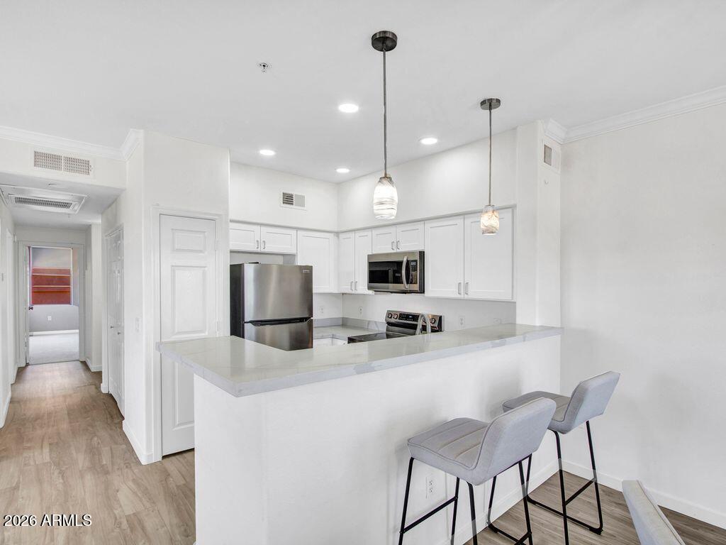 EDGE AT GRAYHAWK CONDOMINIUM - Residential