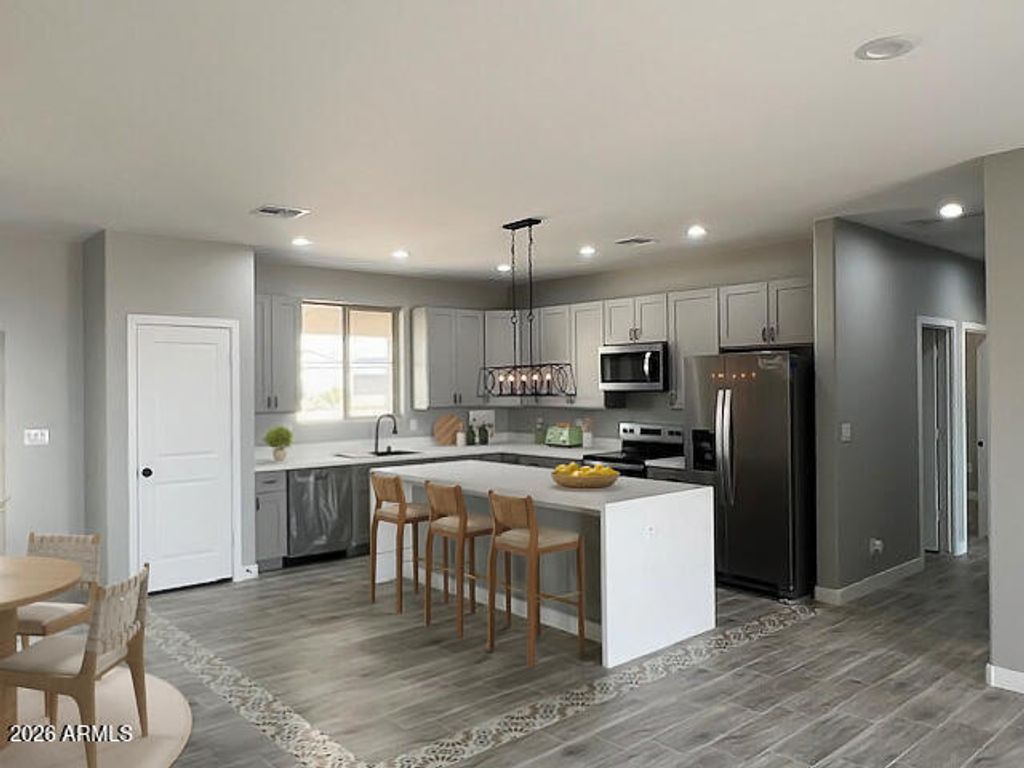 Photo of 504 N 297th Lane, Buckeye, AZ 85396 (MLS # 6974104)