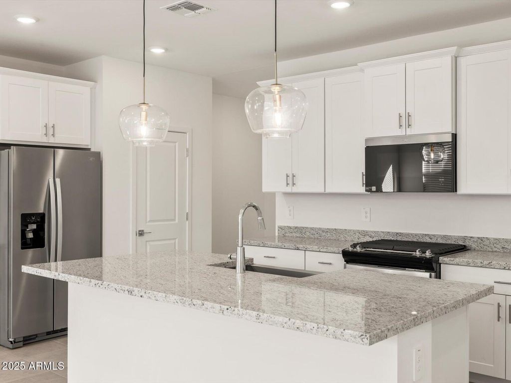 Photo of 17566 W Woodlands Avenue, Goodyear, AZ 85338 (MLS # 6952416)