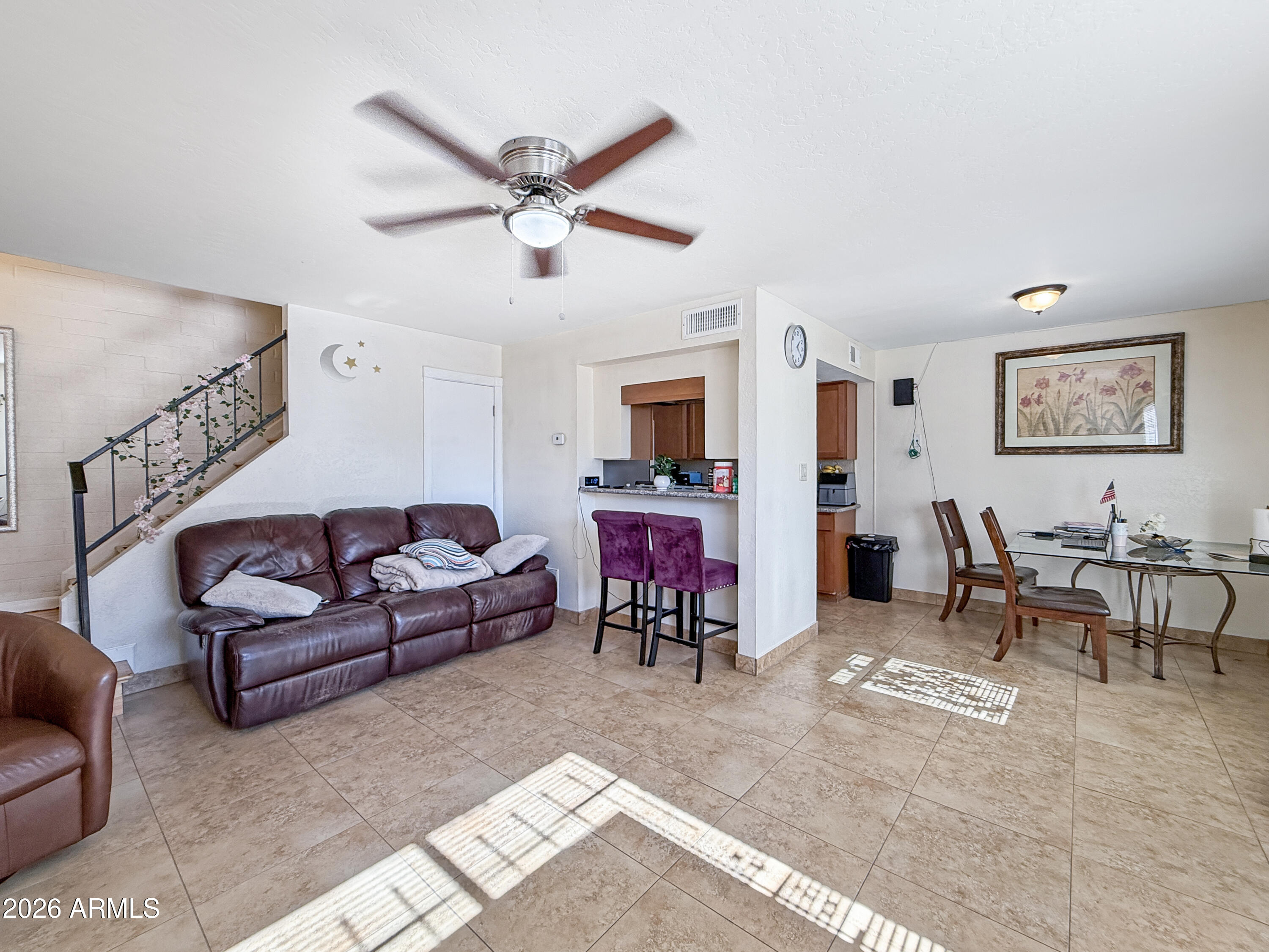 6855 W DEVONSHIRE Avenue