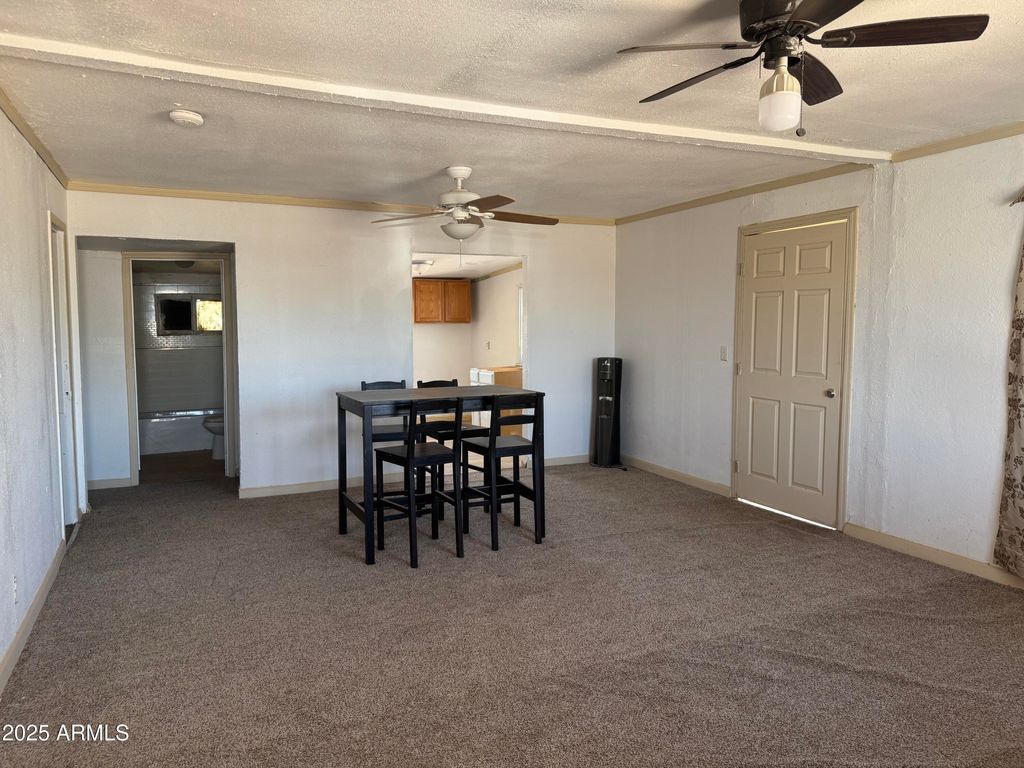 Photo of 595 W Coolidge Avenue, Coolidge, AZ 85128 (MLS # 6903938)