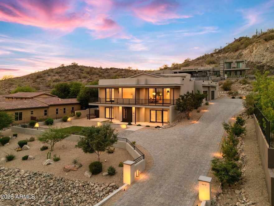 Stunning 3-year-old desert contemporary residence in gated hillside community offering 7,700+ SF of refined modern living. Features 12-ft flat ceilings in most rooms and an impressive 18-ft ceiling in great room. The home includes 6 bedrooms, 5.5 baths, plus a third-level interior suite with bedroom, bath, and loft ideal for guests or private retreat.

Expansive chef's kitchen with oversized statement island flows into open living and dining areas. Three gas fireplaces enhance comfort and ambiance. Walls of glass capture mountain and city views from most windows and extend living spaces to covered patios and decks.
A private atrium courtyard serves as the centerpiece for outdoor living, featuring an infinity-edge pool with heated spa perfect for entertaining and private dining. Designed for true single-level luxury living with more than 5,700 SF on the main floor, where the kitchen, entertaining areas, and garage access flow effortlessly together.

It was built with the newest technology block construction look up ICCF BLOCK to know more about the amazing benefits of integrated composite concrete blocks. ONLY 516$ a square foot at this price!
DON"T MISS THE VIDEO...