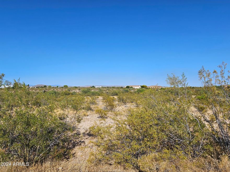This is your chance to build your dream home. Located just outside of Wickenburg in Vista Royale Subdivision. No HOA! Paved roads. CCRs restrict to site built only. Close to State land. Lots of room to build your home, workshop and more. Natural landscape. Beautiful mountain views! Easy access to Hwy 93 and Hwy 89 to Wickenburg, Prescott and Las Vegas.
Additional lot available. 3.26 acre.
 MLS #6719090