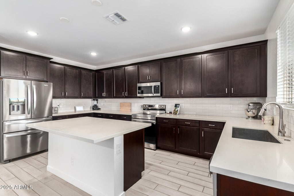 Photo of 17034 W Seldon Lane, Waddell, AZ 85355 (MLS # 6953239)
