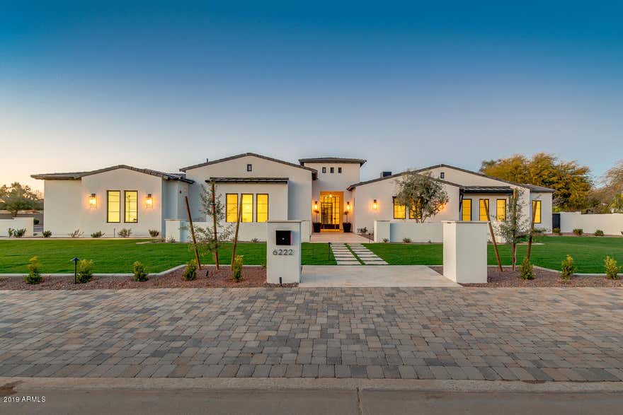 PV's newest estate built by Sticks & Bricks Development, an entertainer's dream! Natural light from every angle with large sliding glass doors and French doors that open up to the many different entertaining/conversation areas, and courtyards. One of a kind gourmet kitchen with two unique islands, hidden pantry, chef appliances, artisan tile, and a custom cabinet door created just for this home.   Master Bath ''spa retreat'' with private outdoor shower/garden, a must see! Kids wing with great room complete with built-in cabinetry, and three secondary bedrooms.  Guest quarters with full bathroom and kitchenette.  Courtyard pool with zero edge raised spa.  Pool house with inside/outside bar seating, kegerator, Subzero beverage fridge, bathroom and outdoor shower!