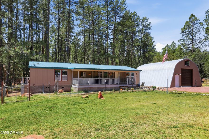 Embrace the true Payson mountain lifestyle at 715 W Standage Drive in desirable Tonto Village! This beautifully updated 3-bedroom, 2-bath manufactured home sits on over a half-acre of open, buildable land surrounded by the Tonto National Forest. Enjoy cool mountain temperatures year-round, abundant wildlife, and peaceful views of towering pines from the spacious front porch overlooking the expansive front yard. Proudly improved by the current owners, the home features fresh interior paint throughout, an updated primary bathroom with new toilet and shower, and a stunning stone hearth and backdrop with a high-quality wood-burning stove for cozy evenings. Outside, the property has been meticulously Firewise-cleared of brush and lower tree branches for safety and beauty. Additional enhancements