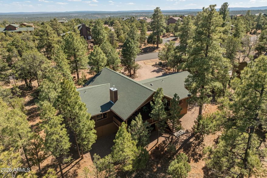 Beautiful Mountain Retreat! This stunning home features an open-concept living area highlighted by vaulted tongue & groove ceilings, large picture windows, and a cozy gas fireplace - perfect for relaxing after a day of hunting, fishing, hiking, biking or exploring the outdoors. The home offers a split floor plan with 3 spacious bedrooms & 2 full bathrooms, providing plenty of comfort for family & guests. The exterior is designed for entertaining or just relaxing and enjoying the mountain air, boasting large covered decks on both the front & back. Keep the ATV in the garage or the additional storage area under the back deck. Whether you're looking for a part-time getaway or full-time living, come enjoy the tranquility and natural beauty this tree-lined property offers in High Country Pines!