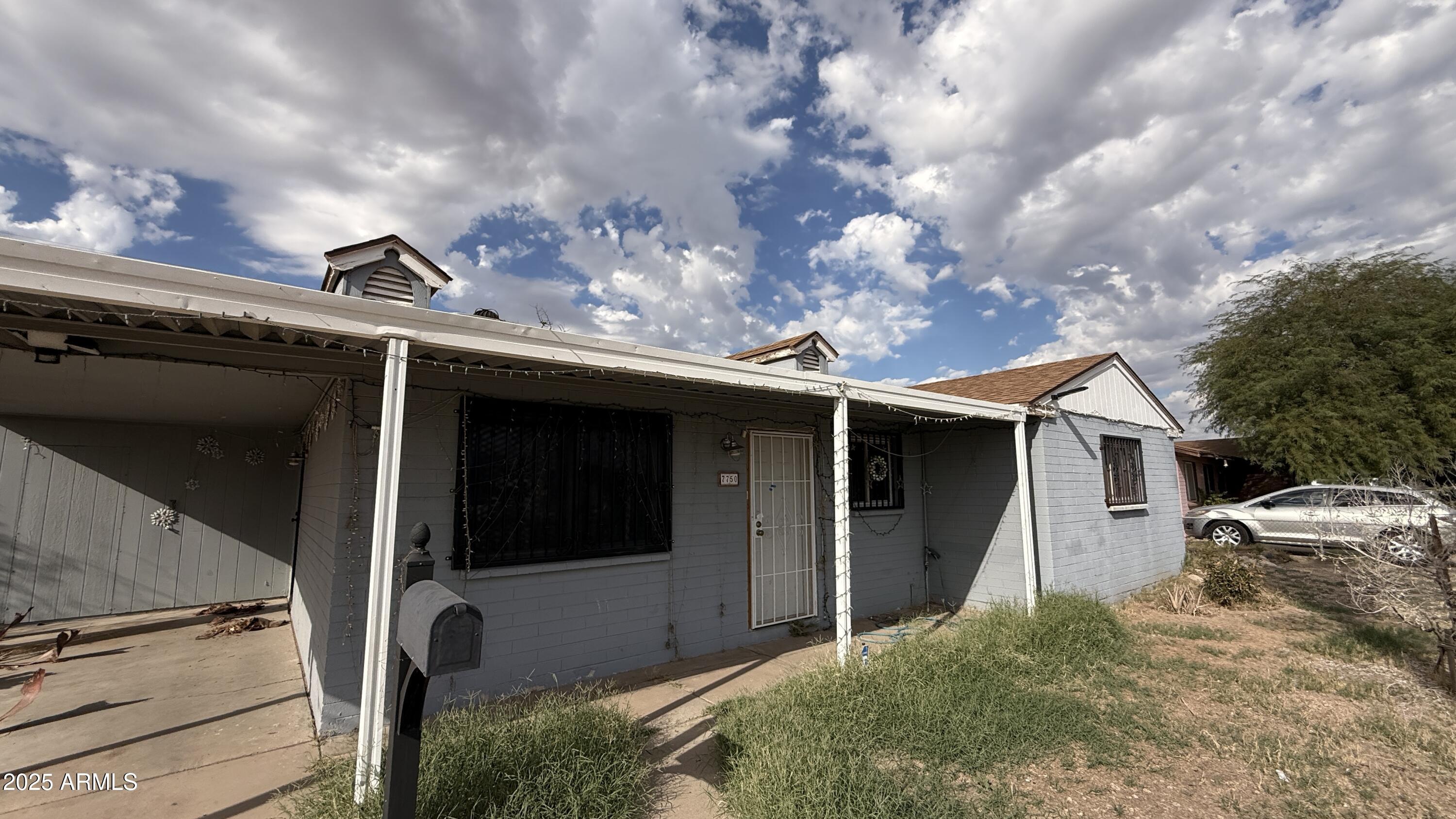 7750 W CLARENDON Avenue