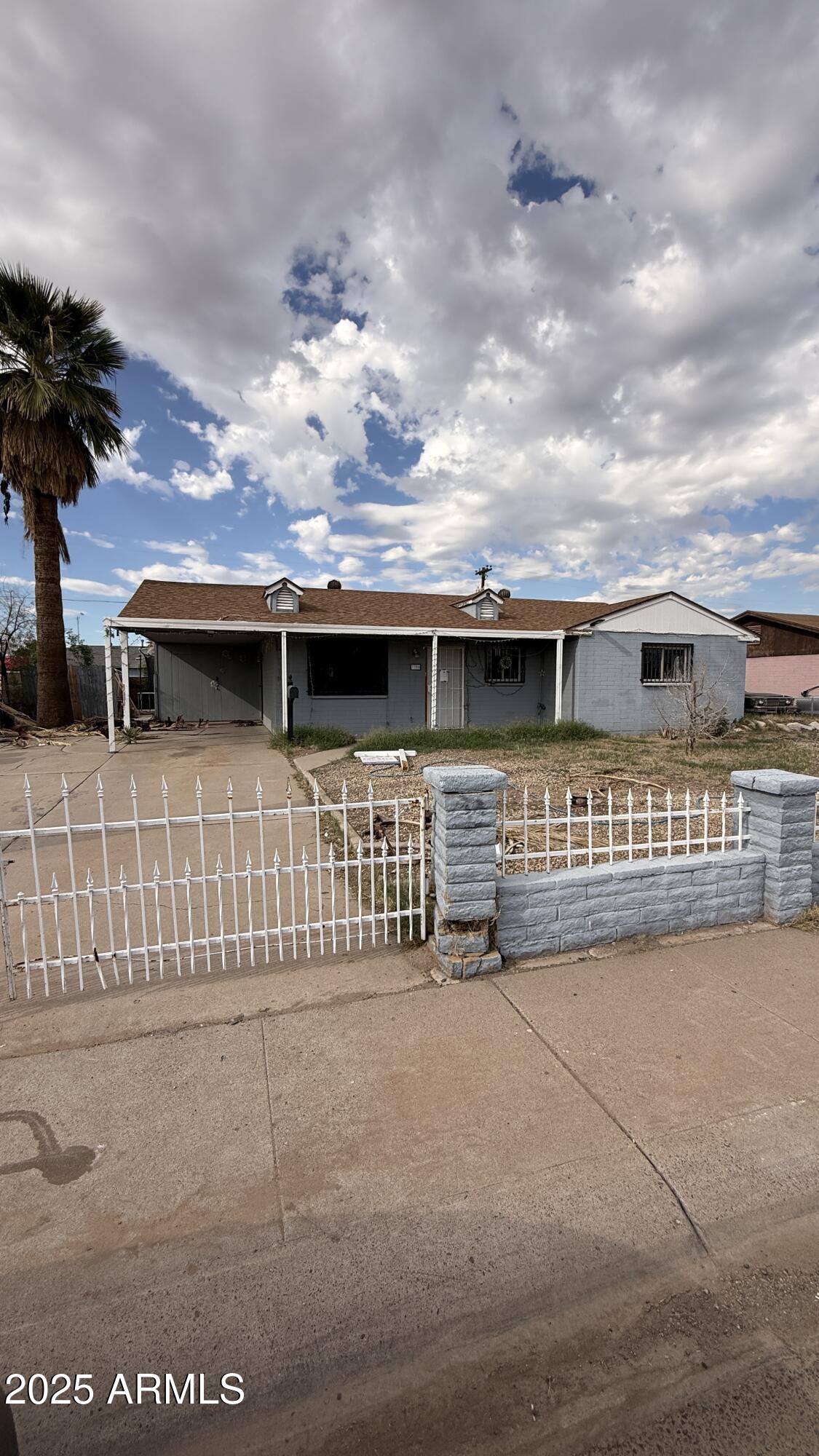 7750 W CLARENDON Avenue