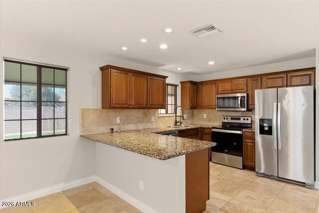 7327 E MCKINLEY Street