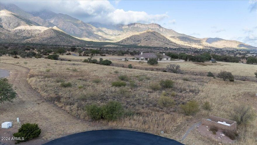 Discover the perfect canvas for your dream home on this beautiful 3.5-acre lot in Wildhorse. Surrounded by scenic Mountain views and quiet desert grasses, this property offers ample space for building your ideal residence while enjoying the tranquility of nature.
The lot is conveniently located within 30 minutes from either Sierra Vista, or Bisbee, with shopping, dining, and parks. With easy access to major highways, commuting to nearby cities is a breeze.