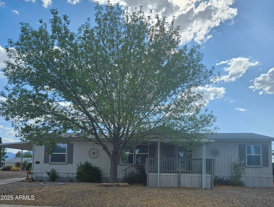 3 bedroom, 2 bath with covered porches front and rear. All rooms are comfortably sized. Master Bath is Huge! Screened in room off back porch. Great room, formal dining room, split floorplan. Nice sized lot with an elevated mountain view. Lot adjoins community walking trail and offers easy access to community Gazebo.