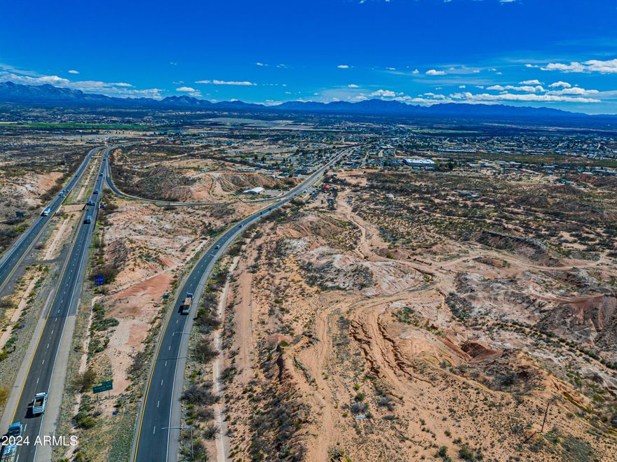 5 Parcels Total
The first driveway/curb access off I-10 exit. Prime location. Visible from I-10.
30.67 Acres Zoned B-2 Commercial and one zoned ''Rural Transitional''
All city utilities readily available.
Close to Walmart.
Great Size: Large enough for commercial operation or complex.
High Traffic Volume on main road and I-10 high Volume.
Good Water Supply
Benson main street location and easy commute to Tucson, Tombstone, and Sierra Vista.
Potential Uses: Factory Outlet Shopping Center, ''Big Box'' Store, Motels and Restaurants, Commercial Business Park, Large Semi Truck, RV Park, Mobile Home Park, Manufactured Home, or Residences, Automotive Truck Travel Center, Service Mall, Municipal/Government Office Complex. More Photos and Aerial soon.
Individual Parcel(s) sales POSSIBLE!