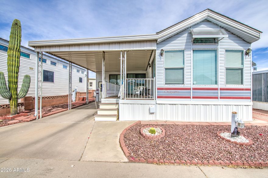 Beautifully maintained West facing home in Carriage Manor Resort, a premier 55+ Community where you OWN THE LAND! Outside you have a very nice custom Trex deck, roof shingled in 2018 and under the house you have all PEX plumbing. Inside you'll find gorgeous laminated floors. Sleeper sofa in front living room and 2 sleeper sofas in the large Arizona room. Carriage Manor has 24/7 on site security, a heated SALTWATER pool/spa, fitness facility, Tennis, Pickleball, Bocce, Shuffleboard, Golf Club, Billiards, Lapidary/Silversmith, Ceramics, Glass Art, Sewing, Wood shop, Bingo, Dances parties & many more activities & amenities