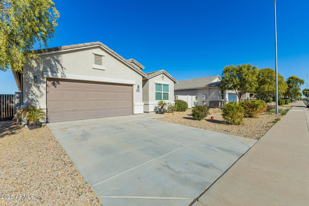 Photo of 36034 W Madrid Avenue, Maricopa, AZ 85138 (MLS # 6958852)