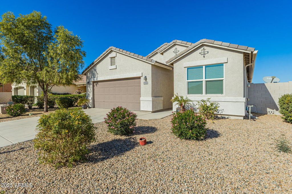 Photo of 36034 W Madrid Avenue, Maricopa, AZ 85138 (MLS # 6958852)