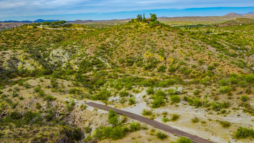 THIS IS OUR HIDDEN JEWEL IN WICKENBURG *SERENE PEACE AND QUIET *HORSE PROPERTY *CLOSE TO BLM LAND *MINIMUM ACREAGE 4.02 AND MINIMUM SQ FT 2400 SQ FT *EXCLUSIVE ELEGANT HOMES IN THE AREA A MUST SEE