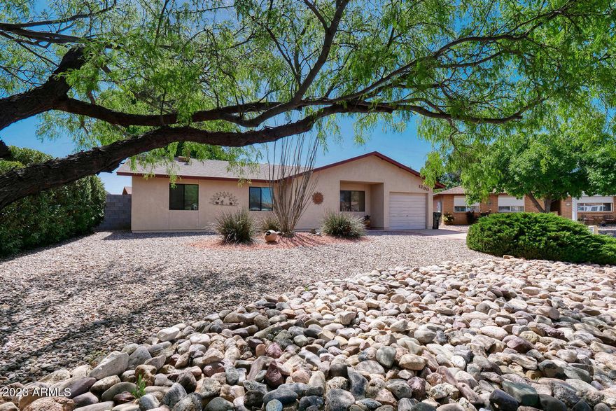 This little doll house is literally move in ready!!  Clean, cute and comfortable!!  This 1239 sf 3 bedroom 2 bath is perfect for a smaller family or retiree.  Kitchen has been updated with new countertops and freshly painted cabinets and some appliances.  Roof and HVAC system have been installed in the last 3 years.  NO carpet...tile throughout!  Located on a quiet cul-de-sac, and close to Pueblo del Sol Elementary school.  The front and back yards have been meticulously manicured and cared for.  Properties like this, don't come along every day!!  Be the ''one'' to call it home before someone beats you to it!  Call today for a showing!
