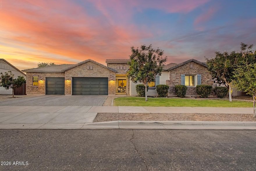 Discover exceptional MULTI-GENERATIONAL living in Queen Creek's location-central Nauvoo Station community. Positioned on an expansive 12,000 sq ft lot, this stunning 5-bedroom, 4.5-bath residence blends timeless design with modern functionality. The heart of the home is a chef-inspired gourmet kitchen featuring a gas cooktop, built-in micro-oven, oversized island, large walk-in pantry, and inviting dining nook, all flowing effortlessly into the spacious great room. The owner's suite is privately situated, offering generous space and a sun-filled bay window. The en-suite bath features a walk-in shower with a rain shower head and rain glass, while dual sinks and dual closets complete the refined, tailored feel. An enclosed den creates the perfect private office or flex space. Designed with versatility in mind, the private guest suite offers a walk-in shower, generous walk-in closet, and its own in-suite washer and dryer--ideal for extended family or long-term guests. The 3.5 car garage has an epoxy floor, overhead storage, and 220V outletThe intelligent floor plan maximizes both entertaining and everyday comfort, while the oversized homesite provides abundant room for a resort-style backyard. Located minutes from top-rated schools, shopping, dining, and recreation, this remarkable home delivers the space, quality, and lifestyle today's buyers are searching for.