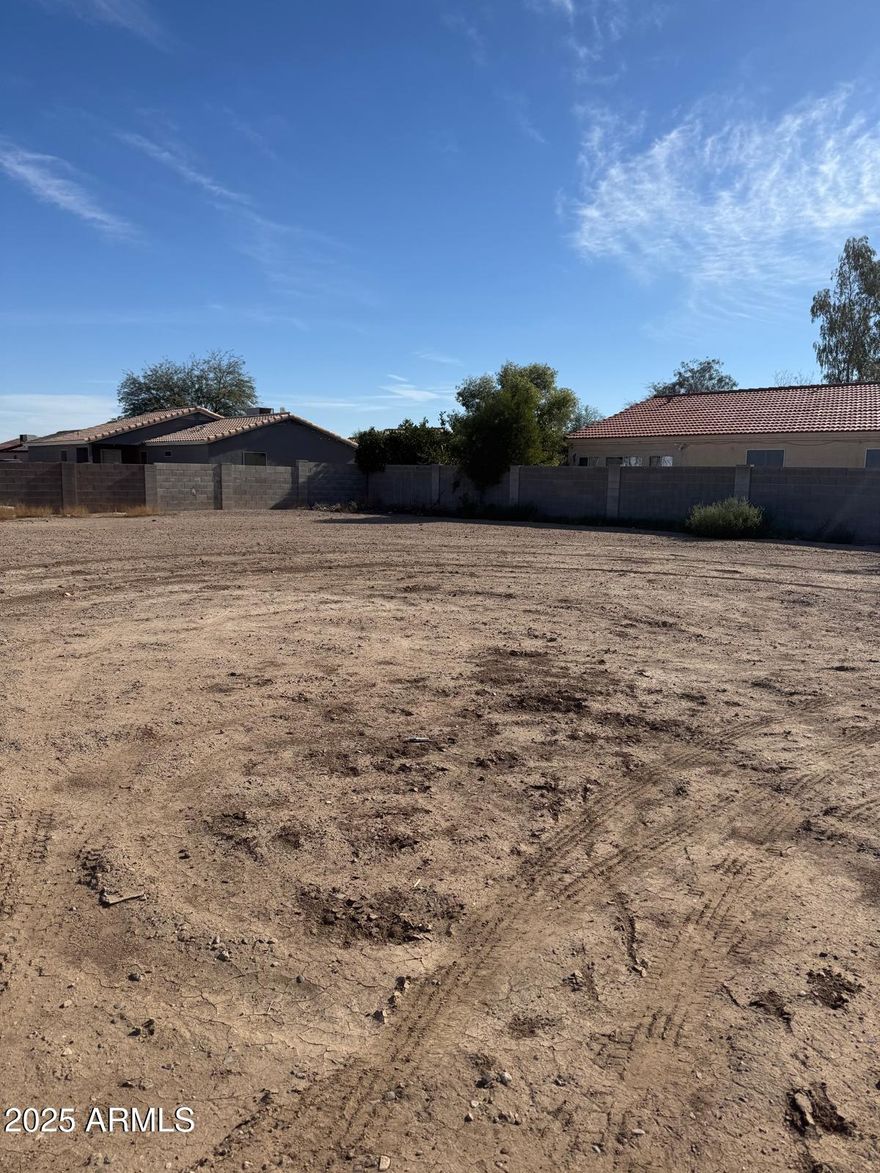 Fantastic opportunity to build your dream home on this spacious residential lot in Eloy! This vacant parcel offers plenty of room for a good-sized home, plus the convenience of water and sewer already on-site. Located in a growing area with utilities and amenities close by, this property provides the perfect blend of peaceful living and easy access to everything you need. Don't miss your chance to create the home you've always envisioned on this well-situated, ready-to-build lot!