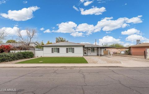 Photo of 3021 N Randolph Road, Phoenix, AZ 85014 (MLS # 6958527)