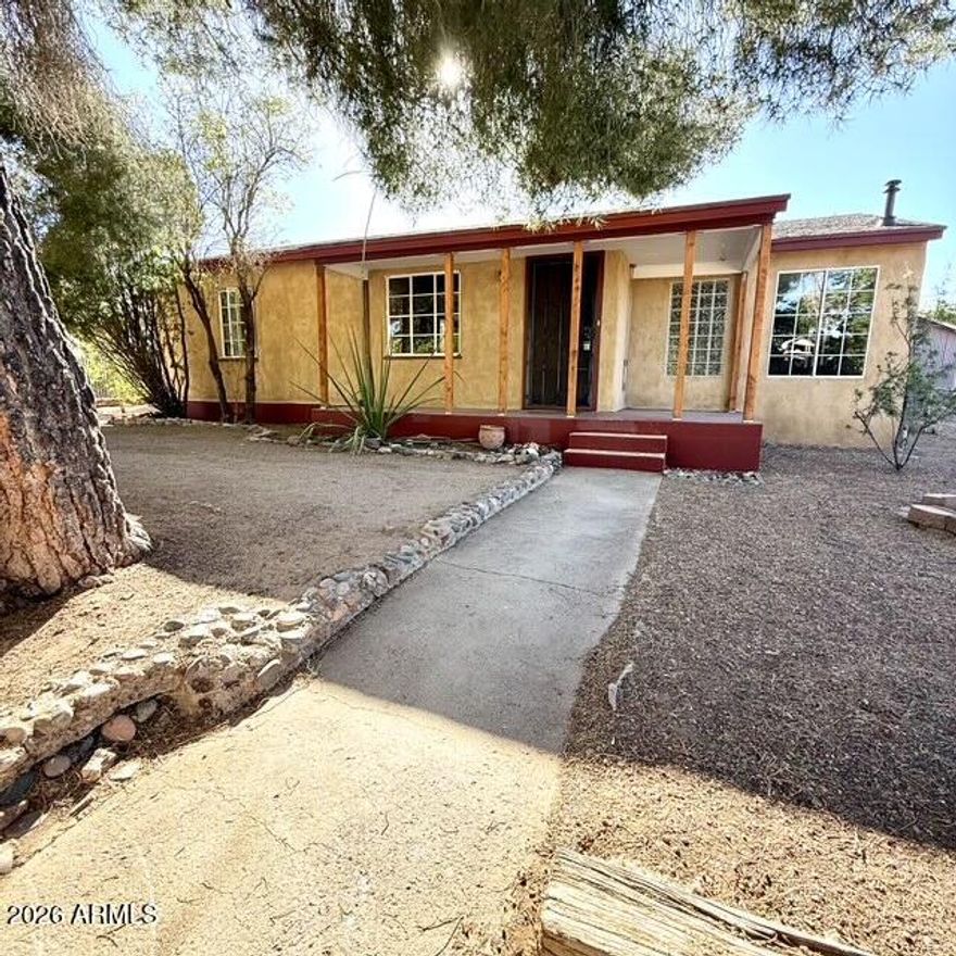This 1956 3 bedroom 2 bath adorable bungalow offers many unique features including a sunken den/office with lots of light, custom eat-in kitchen with copper sink, luxurious master bath, BBQ patio, detached workshop with 220v, carport and secluded studio. Its mature shade trees, fenced yard, bedroom private entrance and street access both front and back add to its versatility and charm.

Its ideal location near Warren's historic district puts you moments away from parks, restaurants, shops and services with Copper Queen Community Hospital, Bisbee public schools, Police, Fire Dept and Dollar General all just a 5 minute drive or less! Make this beautiful home in Warren's quiet and sequestered East Galena subdivision your own private sanctuary!
