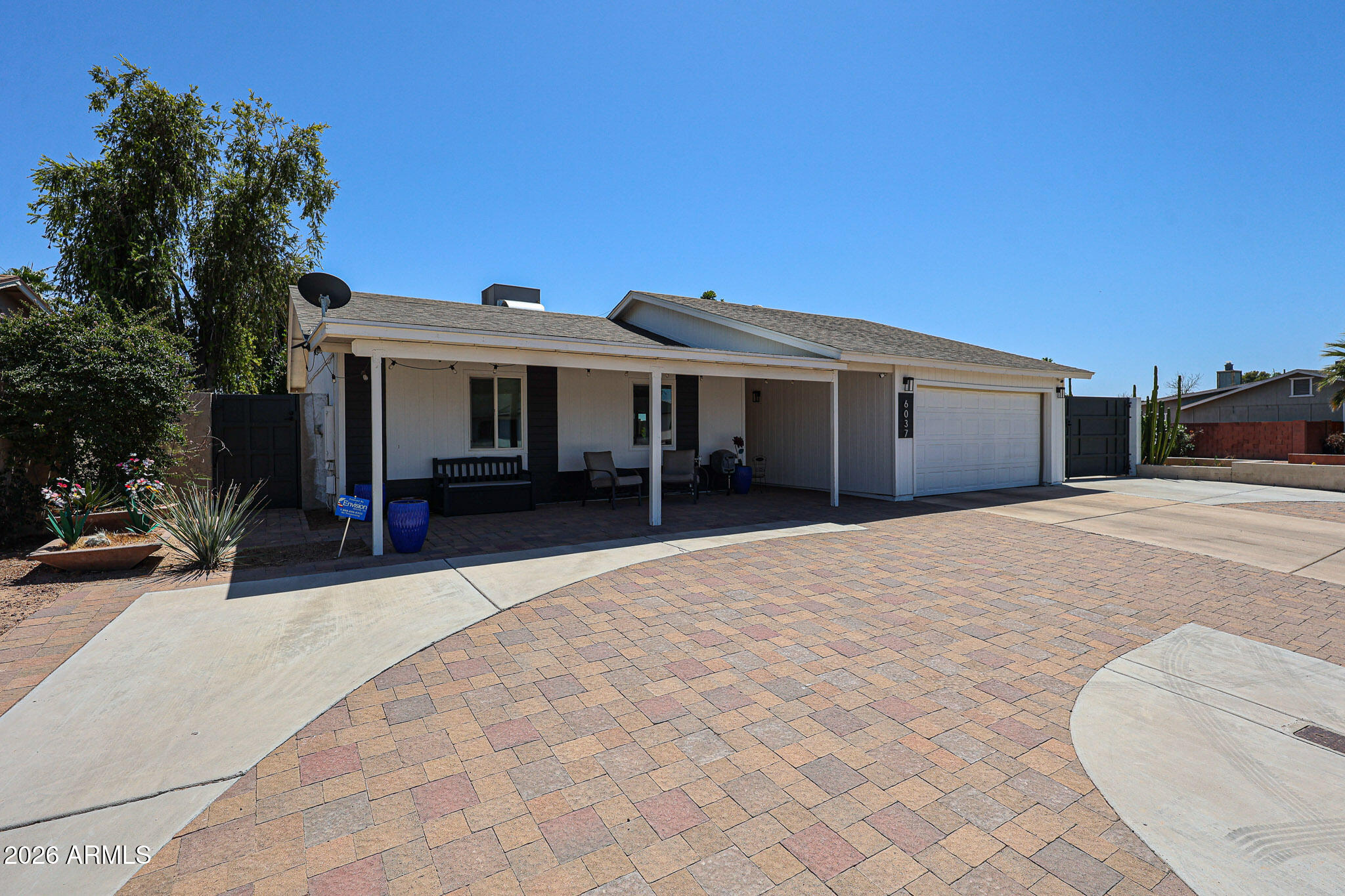 6037 W MARCONI Avenue