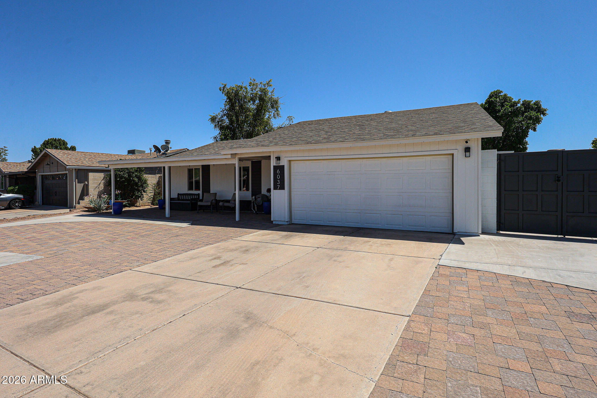 6037 W MARCONI Avenue