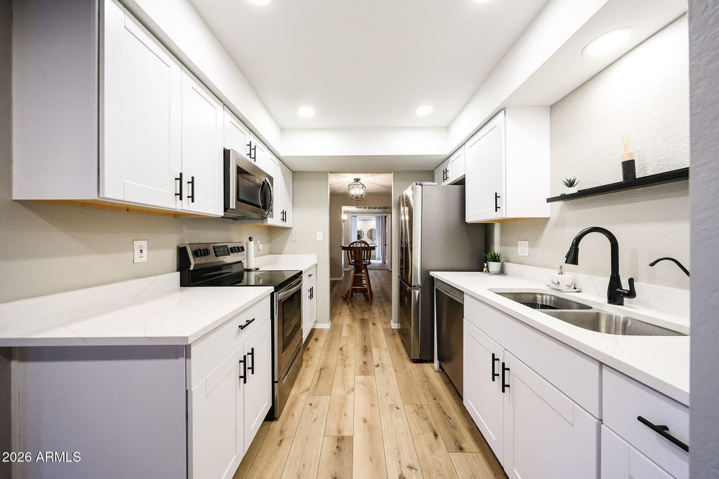 Photo of 9125 E Purdue Avenue #102, Scottsdale, AZ 85258 (MLS # 7004257)