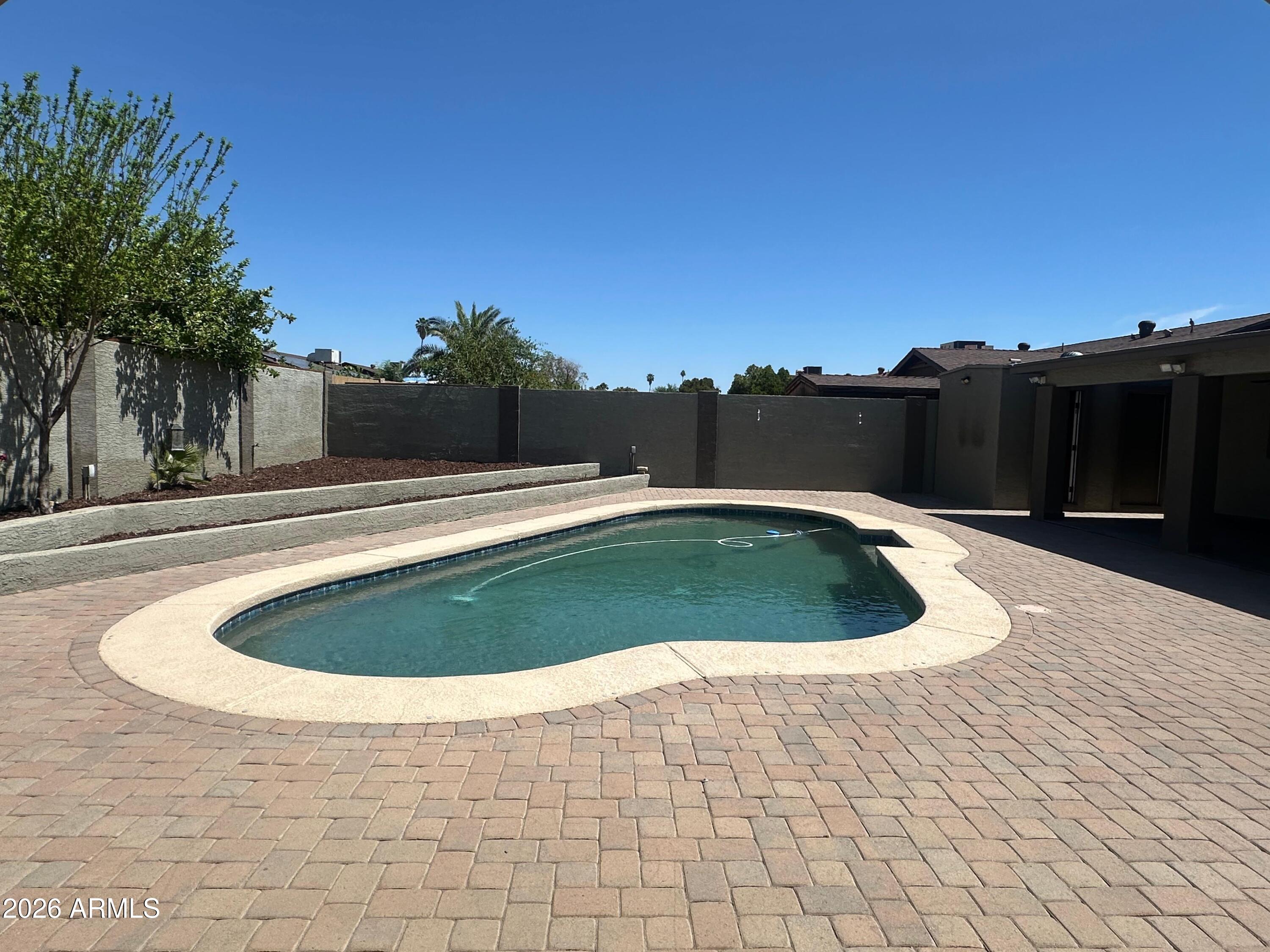 4832 W PURDUE Avenue