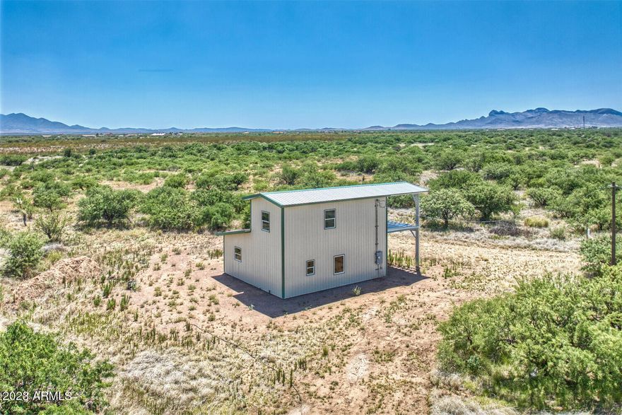 Looking for a project??  This complete Steel shell of a home is ready for someone to finish it!  Super cute structure offers electric to home, brand new private well, windows and, doors.  The workshop downstairs or the large loft space could be converted to a second bedroom. 
This comes complete with all the documents, floorplan and sits on 20 acres.  This could be a perfect barndaminium as you can finish it the way you want!  Property comes with active 6 month Building Permit.  Call today for more information!