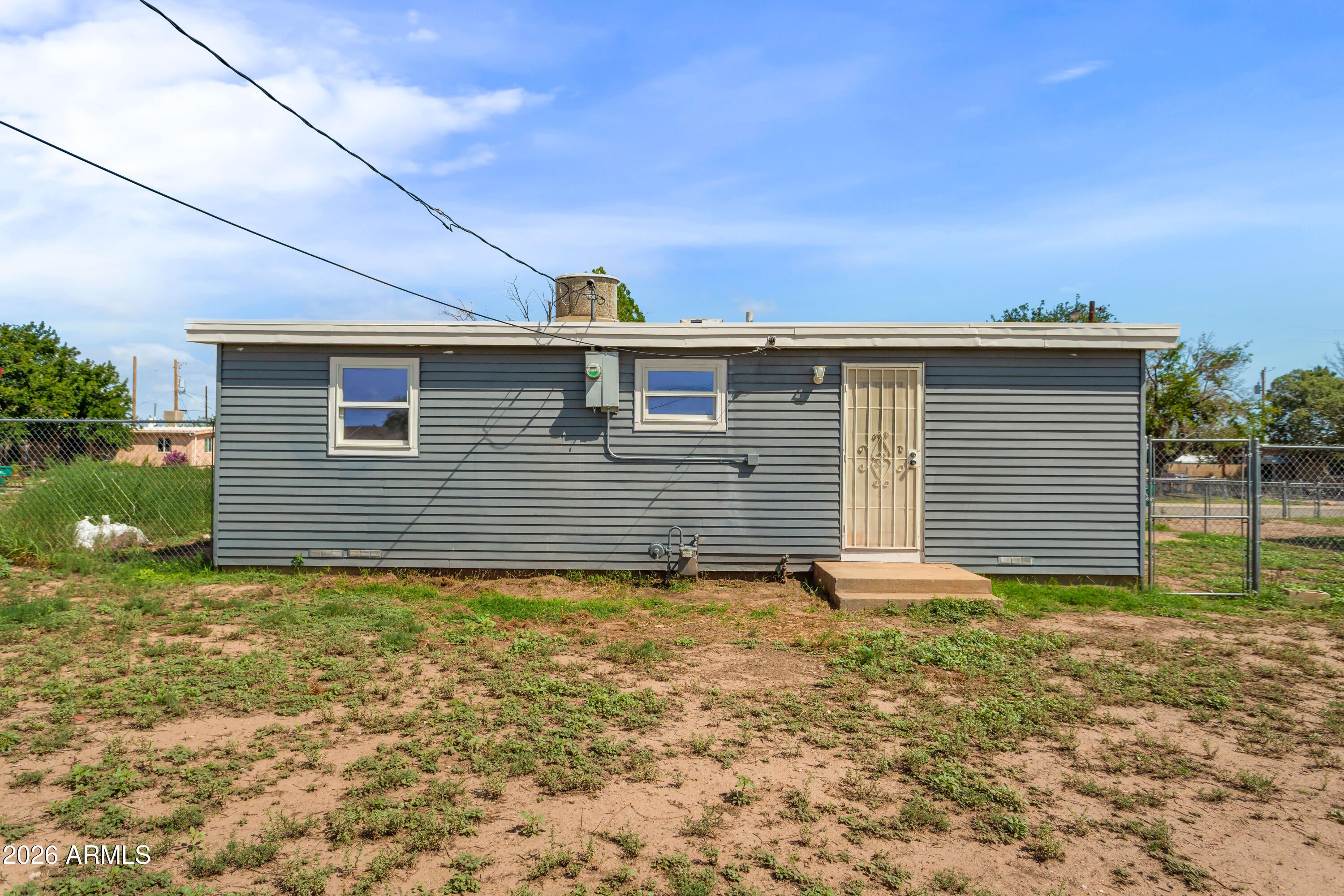 106 E APACHE Street