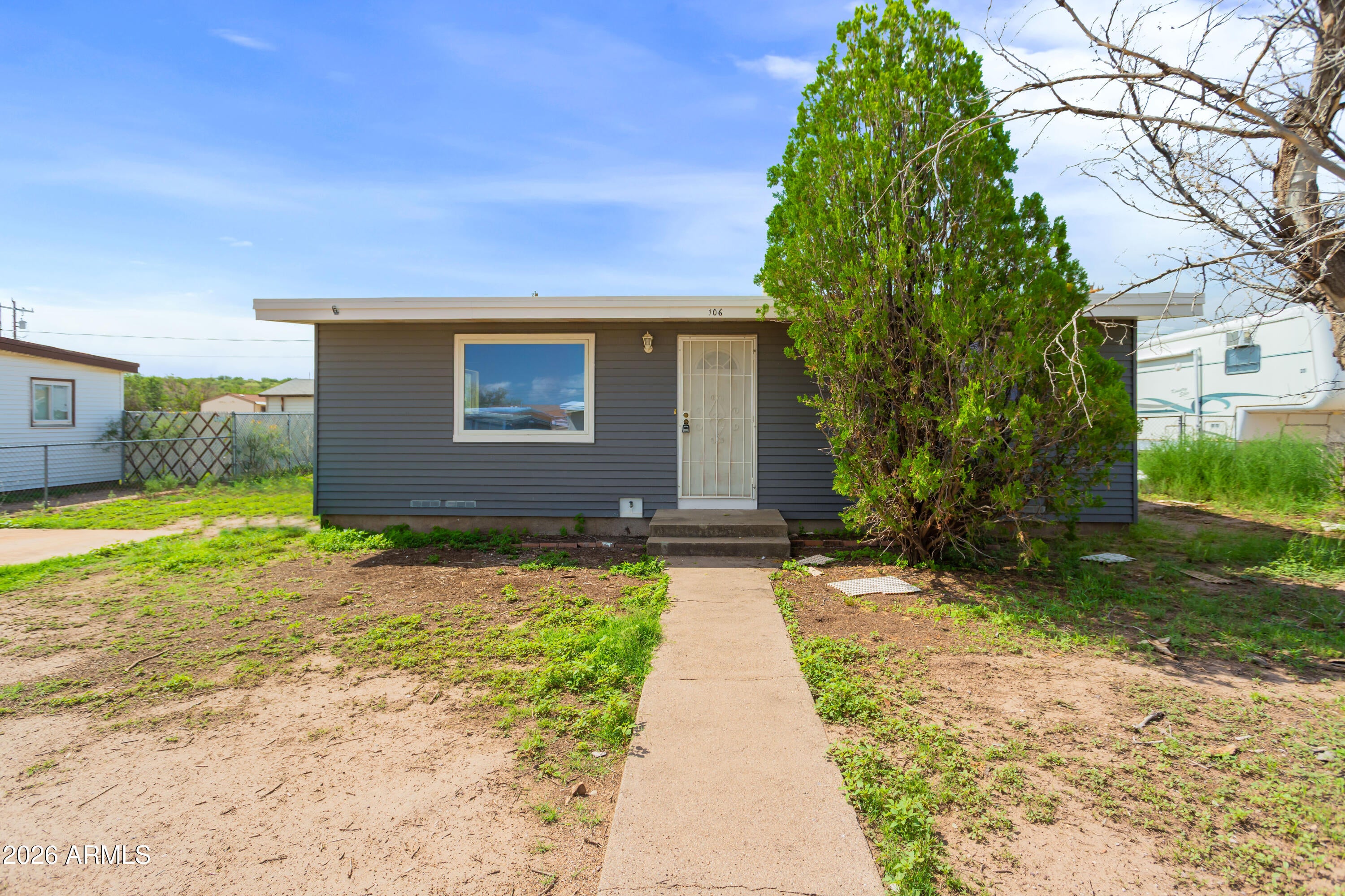 106 E APACHE Street