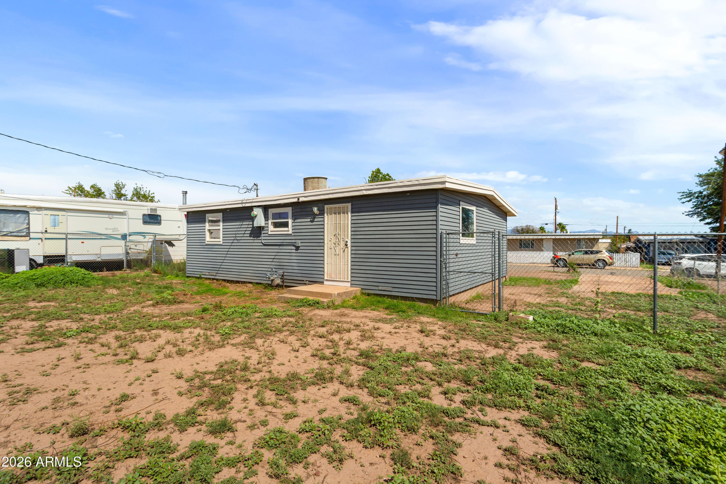 106 E APACHE Street