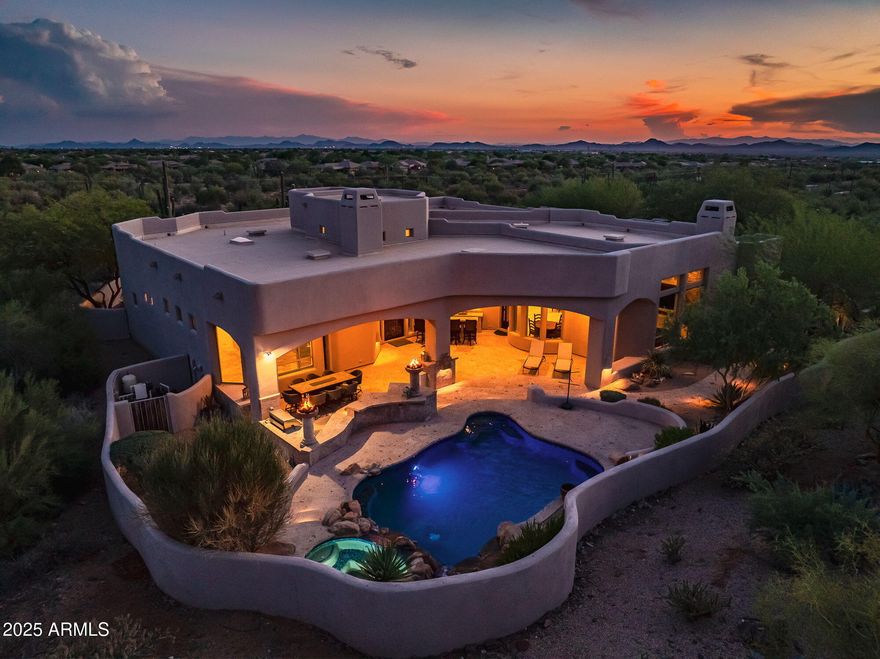From cowboy boots to candlelit dinners — this Carefree escape is where desert magic meets everyday luxury. Perched in the Black Mountain Foothills, mountain views wrap around you while a Pebble Tec pool, bubbling spa, and fire-lit courtyard set the scene for unforgettable nights. Inside, it's all about living big: Sub-Zero fridge + freezer drawers, wine bar, Café dishwasher, and a master suite that spoils with dual closets, fireplace, and a spa shower built for five-star living. Every bedroom has a walk-in closet, plus there is a spectacular office with gorgeous mountain views for work-life balance. Private, gated, and just minutes from Carefree's dining, wine, art, and festivals — this isn't just a home, it's the lifestyle you've been chasing. *House is being sold with all furnishings.*