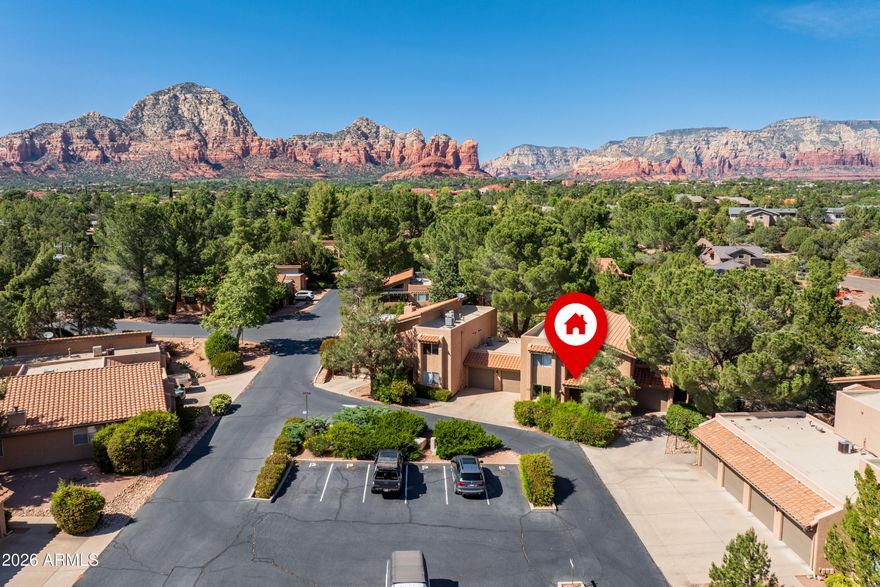 Welcome to the Morning Sun Community. This move-in ready ground-floor condo is in one of Sedona's best spots. This 2-bed, 2-bath home features an open layout with upgraded maple cabinetry, granite countertops, and luxury vinyl plank flooring throughout. Step outside to your private patio and soak in the stunning surroundings with a wash bordering the property. Sunset Park is just steps away, and the Sedona Airport Loop Trail is perfect for weekend hikes. Groceries, dining, and Harkins Theatres are all nearby. Cool off at the community pool or hang out at the clubhouse that is just outside the front door. Worry-free living with red rock views -- what's not to love? Seller will consider owner financing at a rate lower than conventional interest rates.