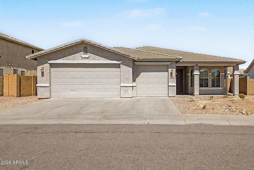 Well-maintained home offering nearly 2,400 sq ft with a functional split floor plan. Recent updates include brand-new countertops, fresh interior paint, new carpet, painted kitchen cabinets, a new electric range, and newly installed front yard landscaping. Spacious kitchen opens to the living area with an island, upgraded cabinetry, and modern finishes--perfect for entertaining. Private primary suite is separated from secondary bedrooms. Low-maintenance backyard with irrigation, plus a three-car garage and RV gate for ample storage. Located in a desirable neighborhood with mountain views and a park within walking distance.