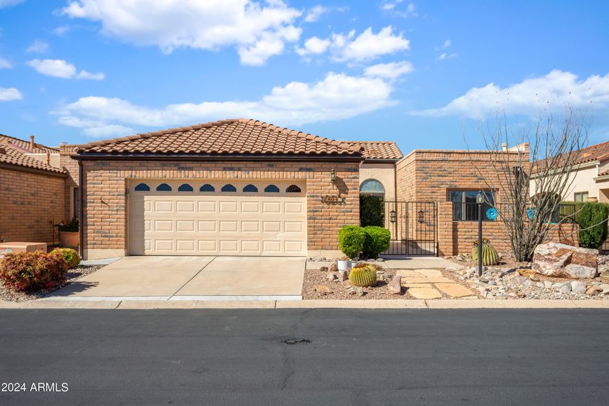 Great home located behind the gates of Mission Shadows waiting for you. 2 bedroom, 1 den and 2 bathroom home sitting on premium lot discreetly positioned next to 11th tee box. This allows for gorgeous views from the back patio, enclosed Arizona Room, living room and master bedroom. Master bedroom has new carpet & 2 spacious walk in closets in addition to updated on-suite with new sinks and fixtures. Guest bedroom has Murphy bed w/ ample shelves and matching desk. AZ room has new tile. 2 car garage attached to the home - laundry is located in the garage. New cool decking to front porch. Current owner is carrying a VA loan that is assumable please contact for additional information.