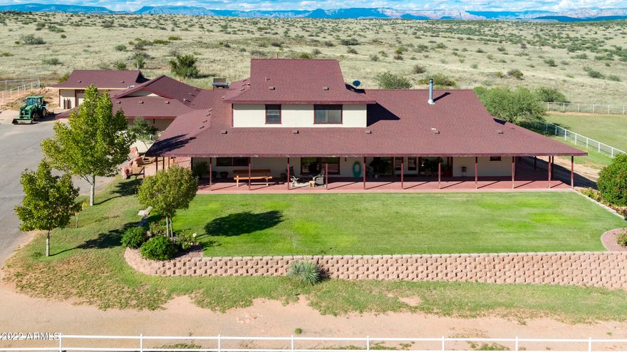 RT Arrow Ranch is a classic Central Arizona horse ranch that invokes a sense of peace & serenity. Ideally located in a tightly held region in the Verde River Valley rich in history & agricultural heritage & only 100 miles from Phoenix. This beautiful ranch consists of a 4 bed/4 bath home w/wrap around porch and sits on 24 acres.  3 car garage with an attached guest suite, creating an additional bedroom. The workshop has 1 parking spot, cabinet/workspace and a wood burning fireplace. The ranch provides for a year round residence or a recreational retreat, ideal for any discipline. Comes complete with 38 stalls, 160 X 300 arena, seven paddocks, 2 irrigated pastures, turnouts, hot walker, 2 round pens, plus much more. The possibilities are endless and there's even room to expand