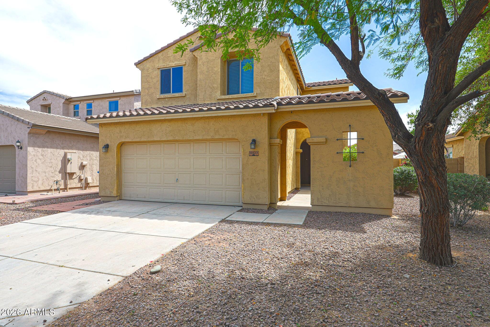 10423 W HUGHES Drive