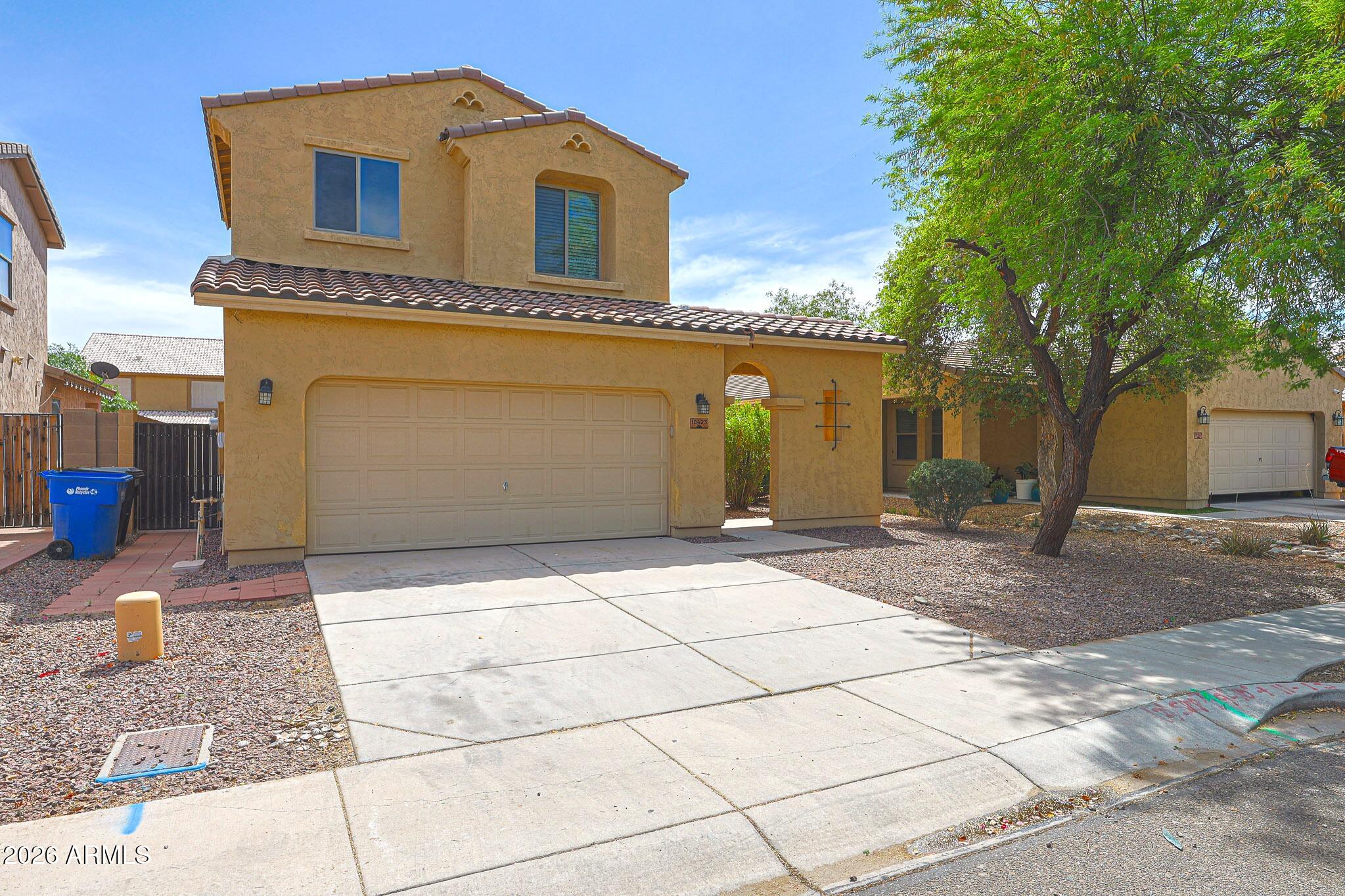 10423 W HUGHES Drive