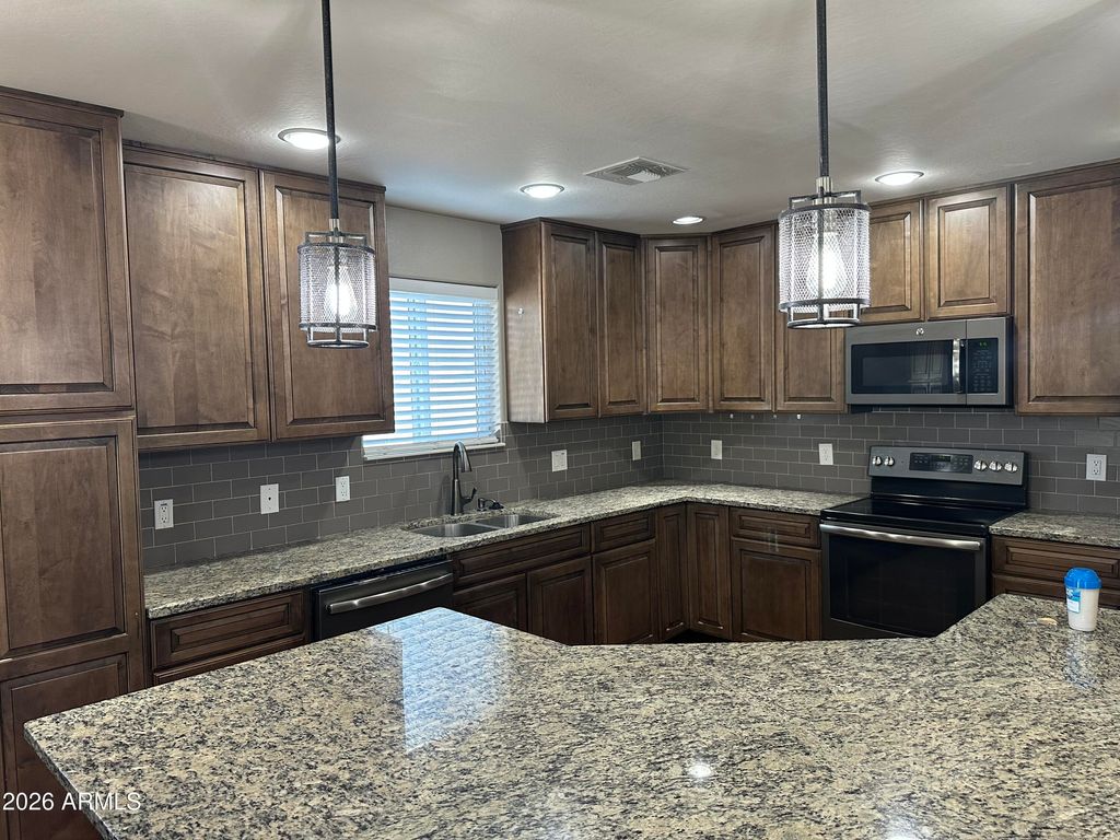 Photo of 1059 W 5th Avenue, Apache Junction, AZ 85120 (MLS # 6970711)