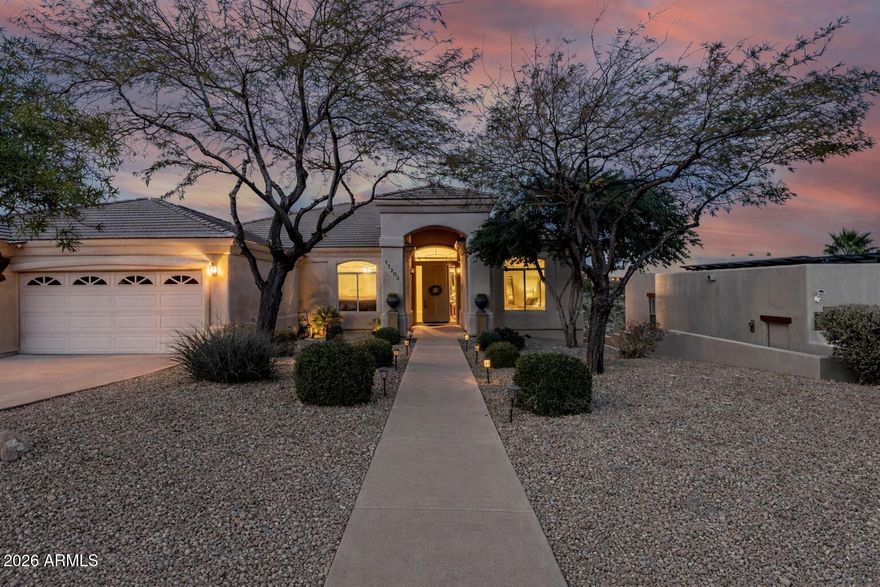 Perched on a coveted hillside lot on a quiet street near town center including retail and restaurants plus quick access to Scottsdale, this Fountain Hills home offers sweeping, unobstructed views of untouched desert terrain and majestic mountain backdrops. 
From the moment you enter, the home's dramatic sightlines draw you through the foyer and into a resort-caliber outdoor retreat designed to captivate. The backyard is a true private oasis, featuring two levels of covered patios, citrus trees, and a sparkling heated play pool, perfectly positioned to enjoy breathtaking sunsets. An expanded patio provides an ideal space for pets, play, or refined outdoor gatherings--all framed by serene natural beauty and exceptional privacy. Pool equipment and heater have also been updated with automatio available just a click away in your phone. Entertaining is elevated in the updated kitchen, showcasing abundant cabinetry, generous counter space, and stainless steel appliances. The main level is thoughtfully designed for ease and elegance, offering a grand great room, owner's suite with a spa-inspired bath, and two beautifully appointed guest bedrooms with a full bath. The lower level expands the home's versatility with an expansive great room ideal for a media lounge, game room, or secondary family space, complemented by a private fourth guest suite with its own bath perfect for hosting overnight guests in comfort and style. Completing the property is a finished three-car garage with epoxy flooring and an oversized third bay capable of accommodating a boat trailer. This remarkable home seamlessly blends sophisticated design, refined comfort, and awe-inspiring views delivering an elevated living experience in every detail. The property has a proven track record as a high-demand Airbnb, with strong occupancy and revenue performance plus outstanding guest satisfaction.