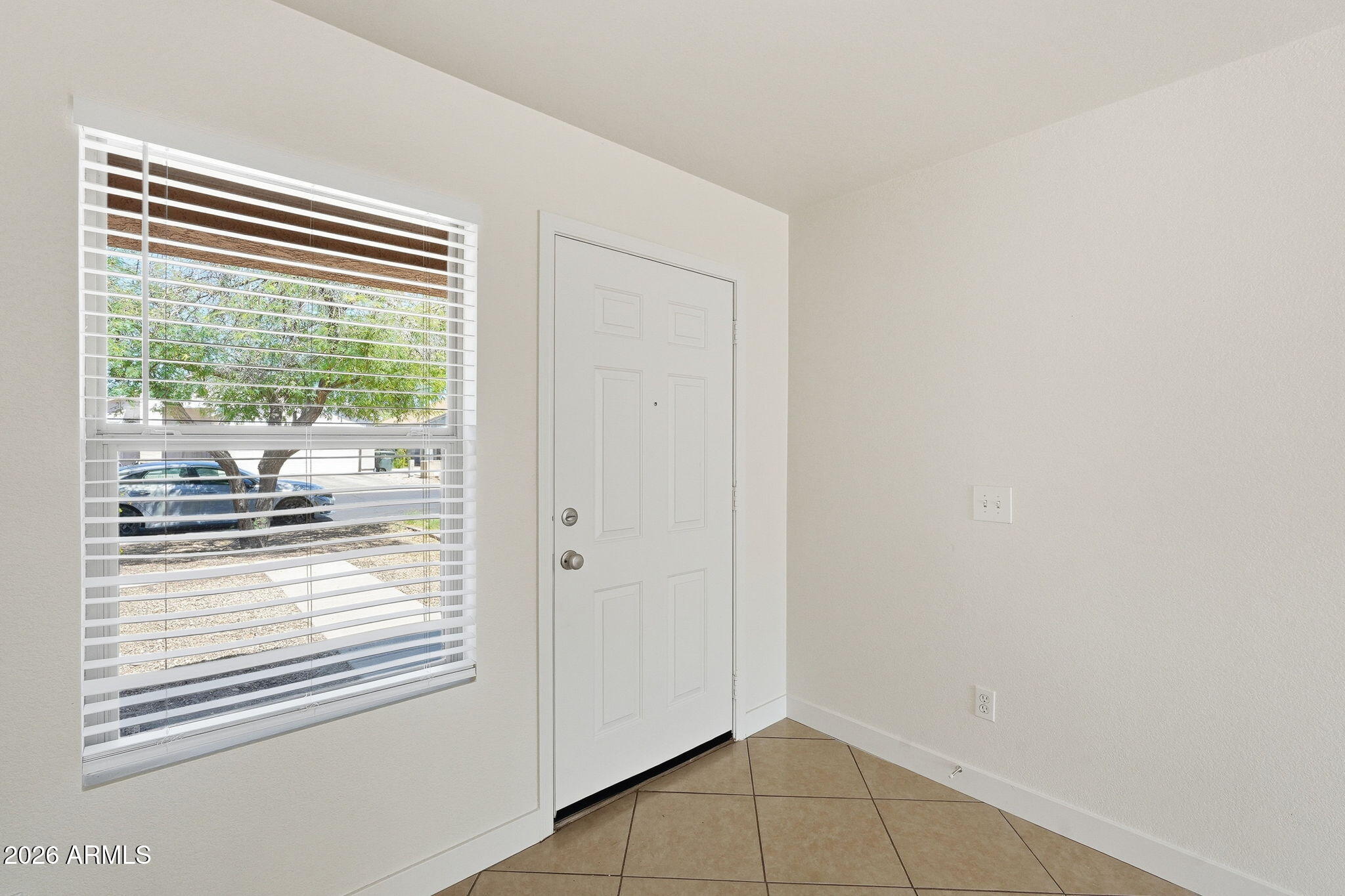 11813 W DAHLIA Drive